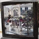 A23. Framed street scene print.